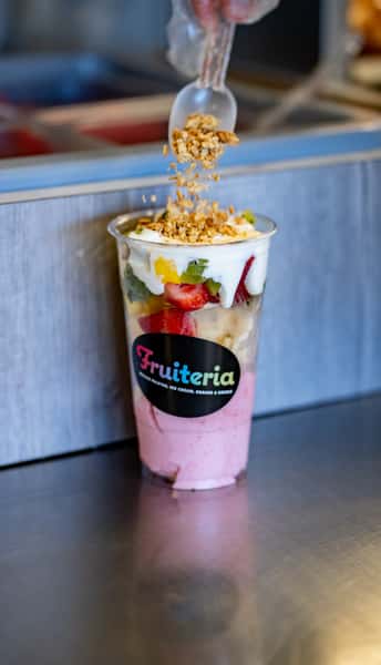 our Angel Cup in medium size. Ice Cream, fresh fruit, sweet cream and topped with Granola and shredded Coconut.