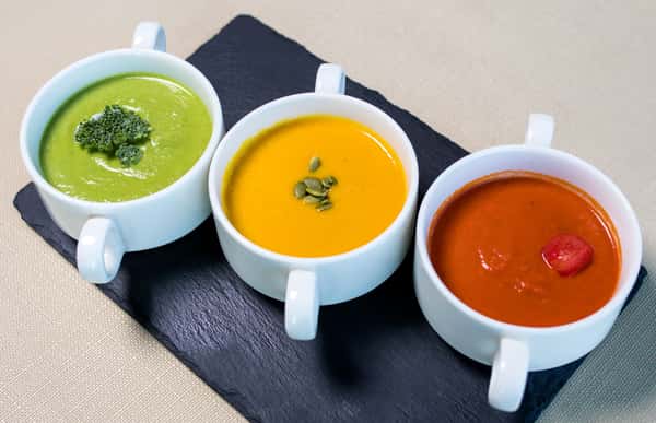 Basil, pumpkin, tomato soups