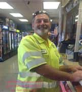 Smiling customer at the counter