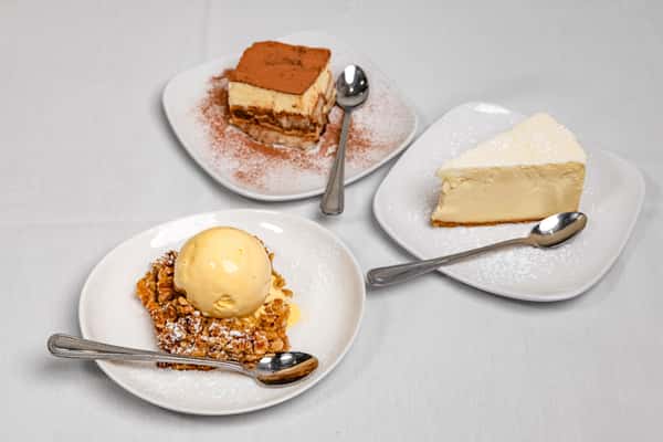 multiple plates of dessert