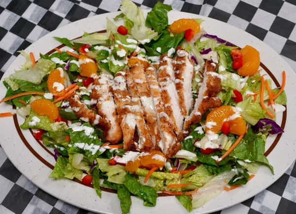 crispy chicken salad with lettuce, carrots, and mandorin oranges