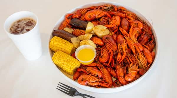 Cajun crawfish boil with corn, potatoes and sausage at Woody's Burgers and Bugs