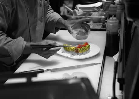 Our amazing kitchen staff creating beautiful meals.