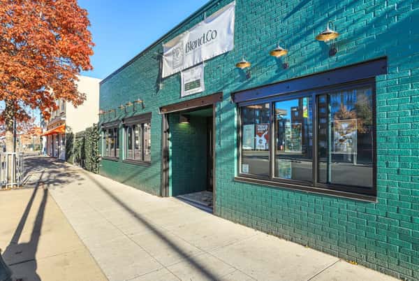 Look for the big green building on Larimer St.!