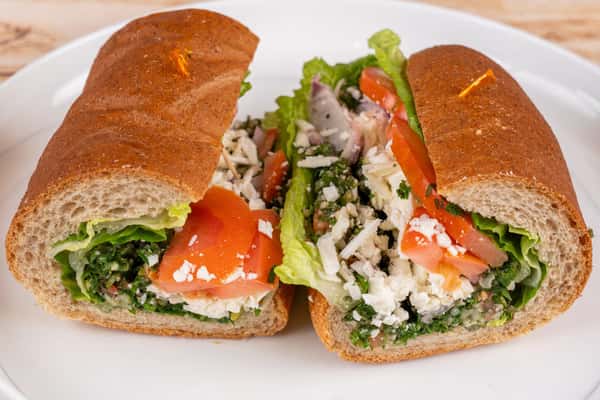 Craving something fresh and healthy? Dive into the vibrant flavors of our Veggie! 🥗 Each bite features a delightful mix of vegetarian tabouli salad, creamy feta cheese, crisp romaine lettuce, juicy tomatoes and tangy red onion. All drizzled with a perfect touch of olive oil. Discover why Veggie is a favorite among our patrons today! #FreshFeast #VeggieDelight 🍅🥬