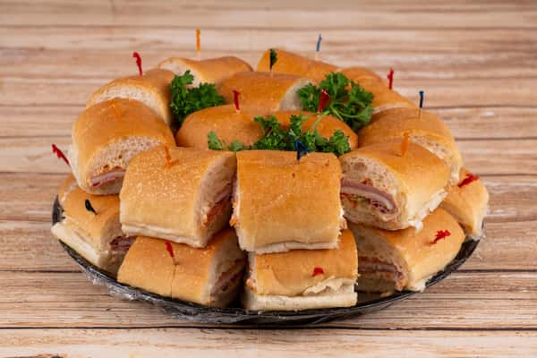 Ready to indulge in a feast like never before? Treat your taste buds to our famous 28-Piece Tray! 🥪🎉 This fan-favorite selection features 7 meticulously crafted Po'Boys, each cut into four delicious pieces. It's the perfect pick for feeding 7-10 people who appreciate the classic taste of FK Nader's Classic Po'Boys. Join the ranks of our satisfied customers who can't get enough of this popular choice! #ClassicPoBoys #TasteOfTradition