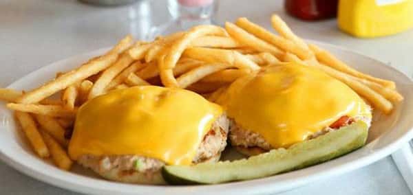 Tuna salad, tomatoes, American cheese, served open face on an English muffin with a side of French fries