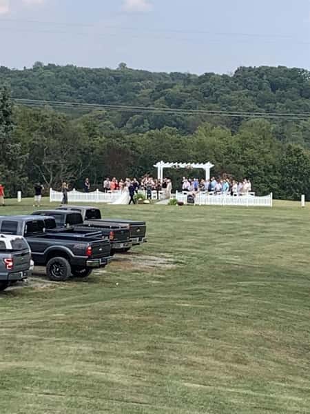 A far away view of a wedding reception.