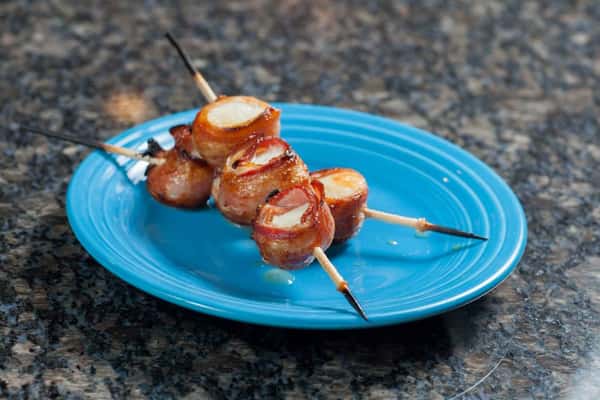 Bacon wrapped scallops on skewers