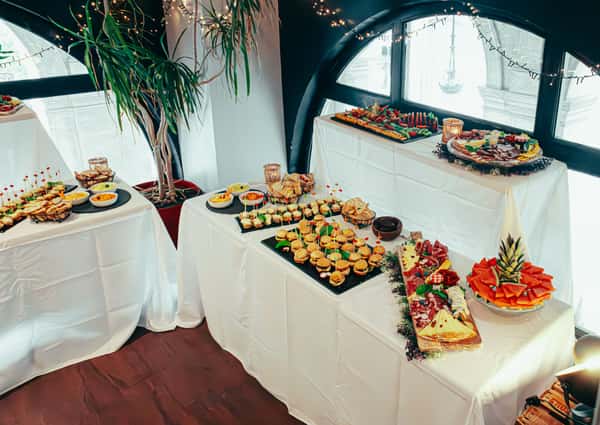 an-elegant-indoor-buffet-table-featuring-a-variety-of-appeti