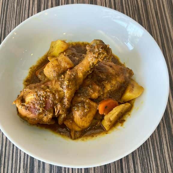 This customer favorite is marinated in Curry with a spicy blend of peppers and spices, a bold, flavorful dish that's cooked slowly over low heat, allowing time for the spices to develop