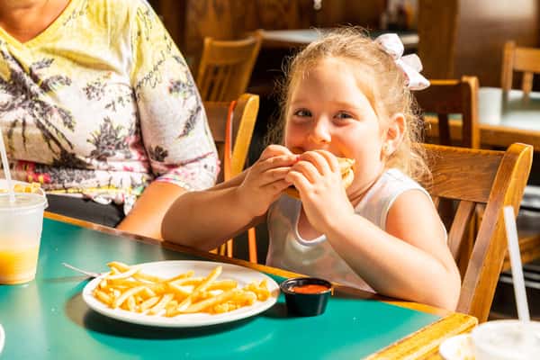 girl eating burger