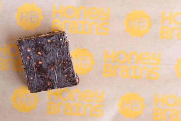 Chocolate energy bite made with wholesome ingredients, cacao, and natural sweetness for a nutritious snack.