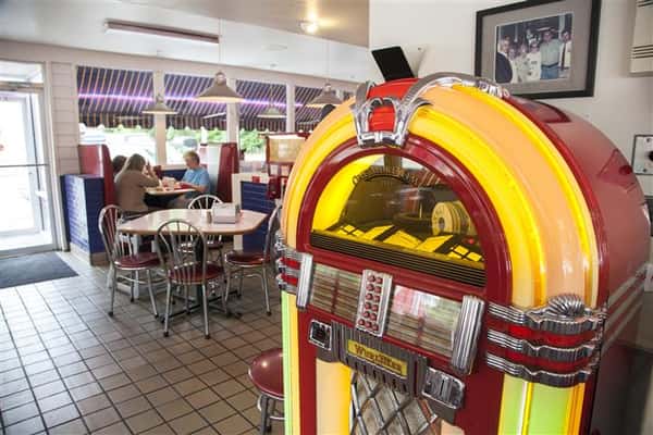 Interior shot of the restaurant with a jukebox