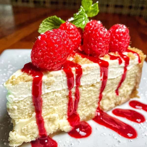 🍰 Sweeten up National Dessert Day with our irresistible Raspberry Cream Cheese Pie! Every bite is worth celebrating. ❤️