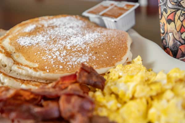 pancake, eggs scramble, bacon and sausage