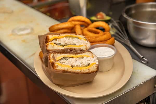 sandwich and onion rings with dip