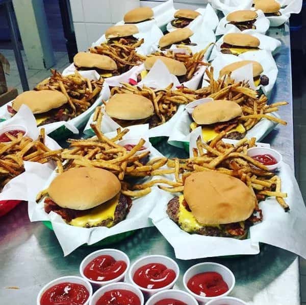Numerous burgers and fries