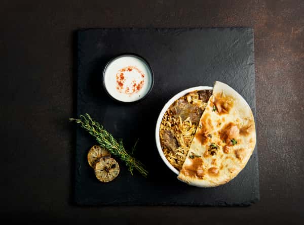 Bone-in Slow Cooked Goat Biryani