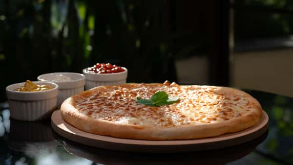 popmenu-mouthwatering-cheese-pizza-with-flavorful-dips-in-natural-li-original.jpg