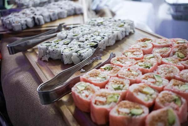 Sushi lined on wooden board