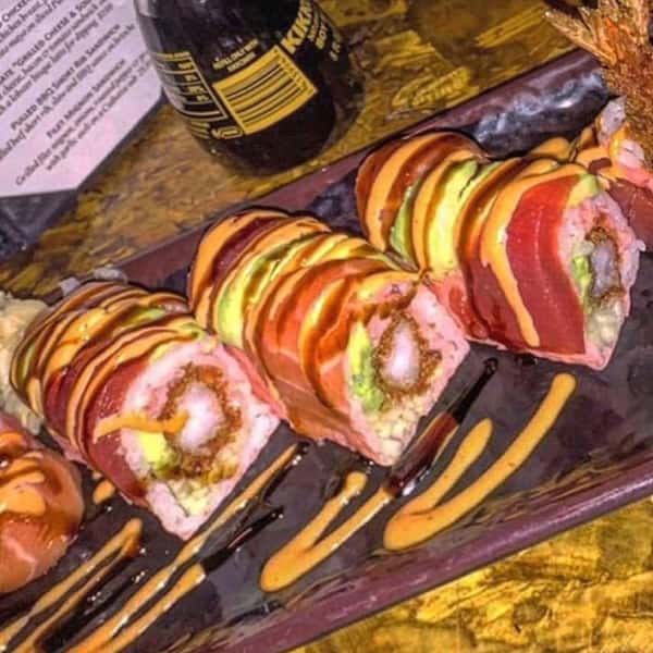 Specialty sushi roll on plate