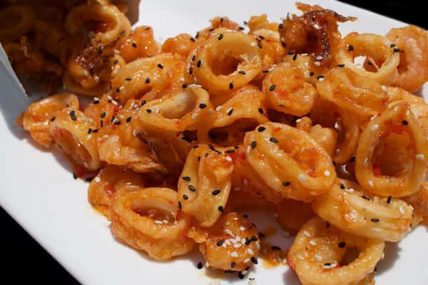 calamari with Sweet & spicy sauce, sesame seeds