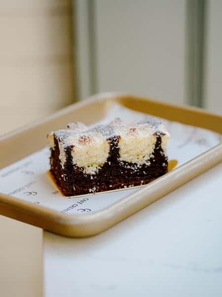 Rich, indulgent, and impossible to walk past… our Chocolate Coconut Cake is bringing serious dessert energy to Café Crèmerie. 

Decadent chocolate meets irresistible coconut for that perfect sweet-meets-tropical combination in every bite. Creamy, dreamy, and just the right amount of indulgent.💛
 .
 .
 . 
#CaféCrèmerie #RiverNorth #FultonMarket #TheSweetLife #WomanOwned