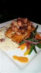 Menu items with mashed potatoes, green beans and fish