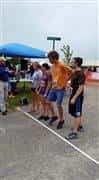 four kids at the beginning of the race