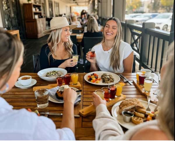 Guests enjoying a wine tasting experience at Rancho Capistrano Winery