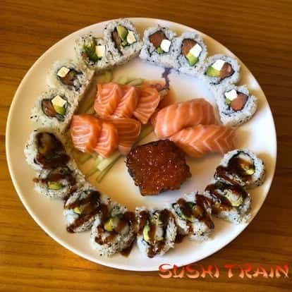 Plate of fresh sashimi slices, featured for restaurant events