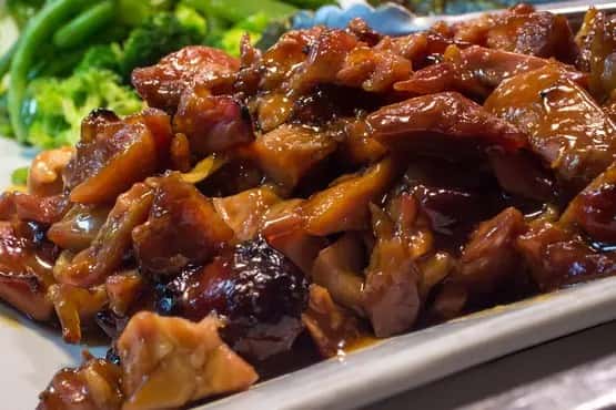 Orange chicken dish glazed in sweet and savory sauce