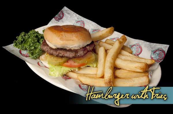 hamburger topped with lettuce, tomatoes and pickles with a side of french fries