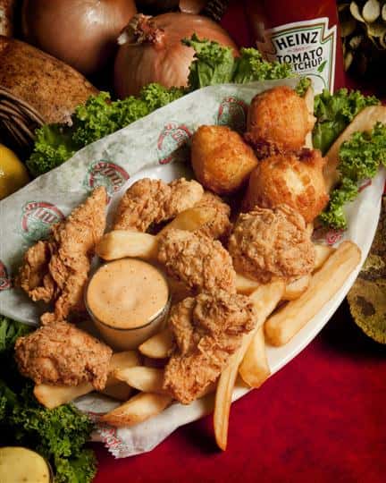 chicken tender dinner with hush puppies and french fries