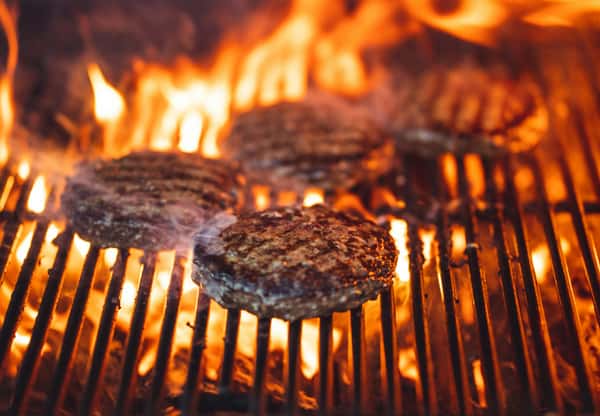 Flame grilled burger patties ready for a hearty meal - burgers in Carrollton
