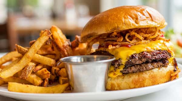 Double cheeseburger on a brioche bun served at Local on North, a modern neighborhood restaurant and bar in Georgia
