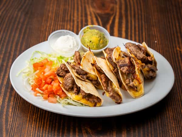 Tacos de Lechón al Carbón ó Tacos Mixtos / Charcoal-Grilled Roast Pork Tacos or Mixed Tacos.