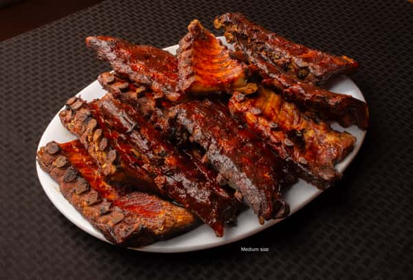 Costillas "Baby Back Ribs" With our BBQ sauce