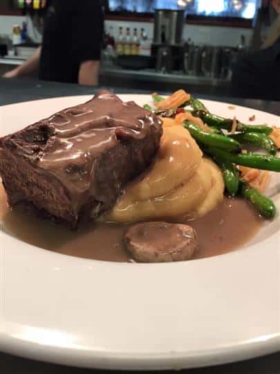 Steak with mushroom sauce, asparagus and whipped potatoes