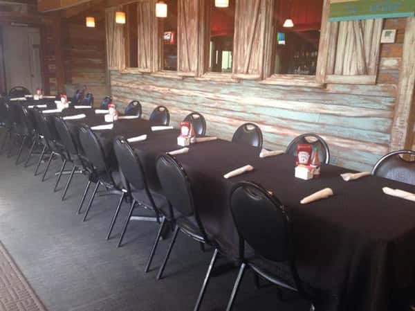 long table with chairs and table cloth