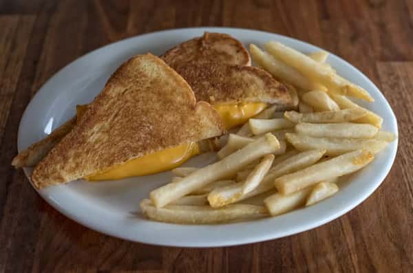 A sandwich with fries