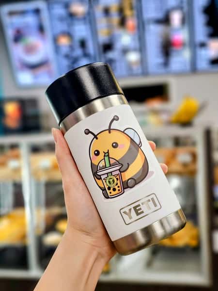 Cute fat bee sticker on a mug