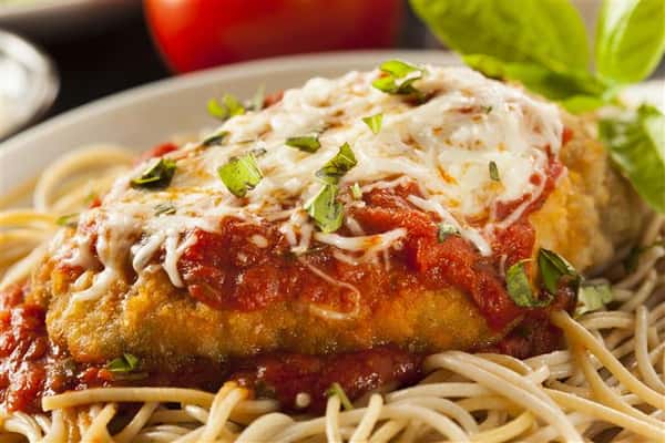 chicken parm entree with spaghetti and cheese