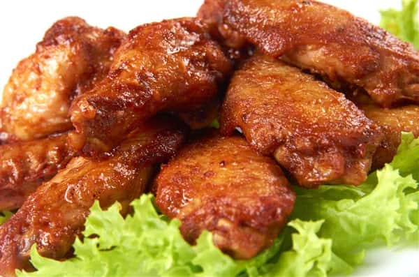 buffalo wings over a bed of lettuce