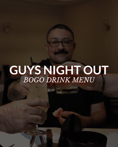 Three guys cheering their cocktails