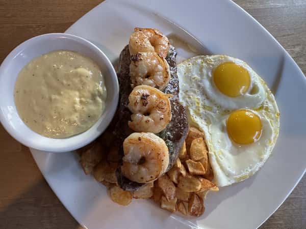 Steal with fried egg shrimp and hash browns