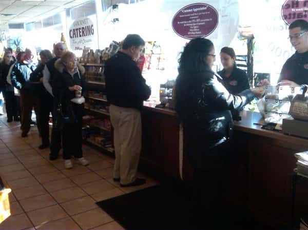customers waiting in line at a counter