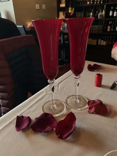 Red drinks with rose petals