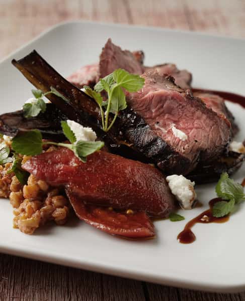 Lamb sirloin pickled tomatoes farro
